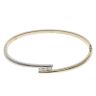 9ct Yellow and White Gold 0.30ct Brilliant Cut Diamond Twist Hinged Bangle