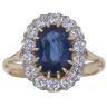 18ct Yellow Gold 0.85ct Oval Sapphire And Diamonds Cluster Ring