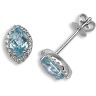 18ct White Gold Diamond 0.15ct Blue Topaz 1.30ct Studs