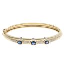 18ct Yellow And White Gold 0.10ct Diamond And Sapphire Bangle