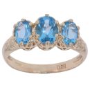 9ct Yellow Gold Blue Topaz Three Stone Patterned Ring
