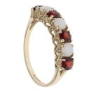 9ct Yellow Gold Garnet And Opal Seven Stone Ring
