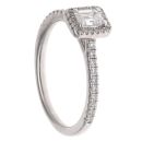 Platinum 0.55ct Emerald And Brilliant Cut Diamond Cluster Ring