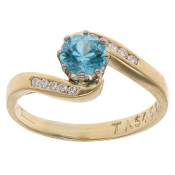 18ct Yellow Gold 0.10ct Diamond And Blue Zircon Twist Ring