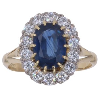 18ct Yellow Gold 0.85ct Oval Sapphire And Diamonds Cluster Ring