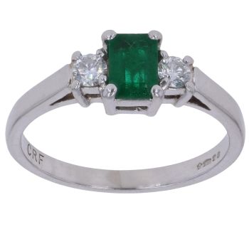 Platinum 0.20ct Brilliant Cut Diamond and Emerald Three Stone Ring